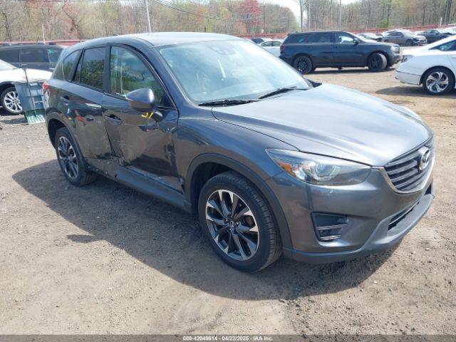  Salvage Mazda Cx