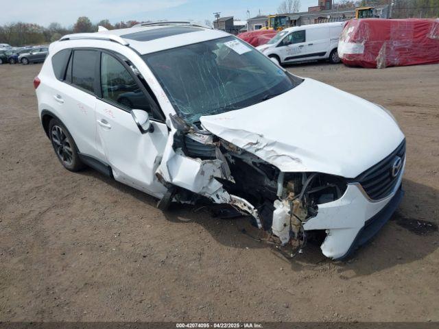  Salvage Mazda Cx