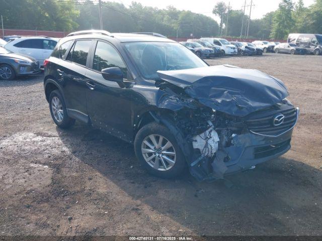  Salvage Mazda Cx